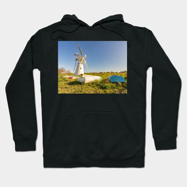 Day boats upside down on the riverbank with Thurne Mill in the background Hoodie by yackers1